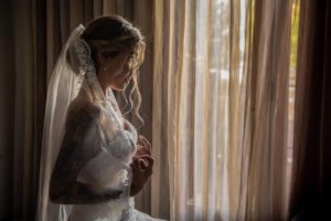 bridal-portrait-holding-dress-1113