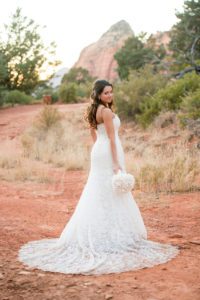bridal-portrait-wedding-sedona-merry-go-round-rock-sunset-floral-1080